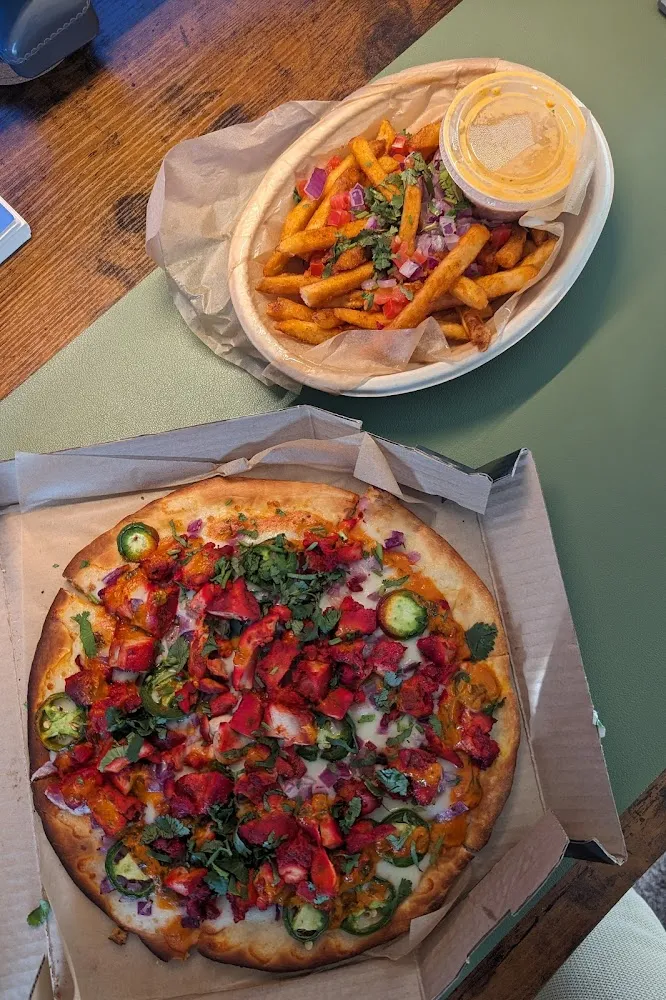Tandoori Chicken Pizza and Biryani Fries
